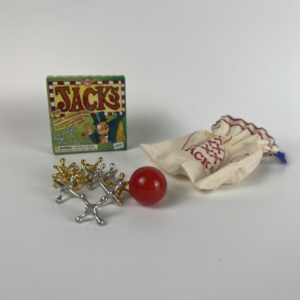 This image shows the variety of jacks, a rubber ball, and bag included within the box.