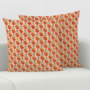 This image shows the orange pattern for the square pillow cover in the leaf and berry pattern.