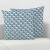 This image shows the light blue pattern for the square pillow cover in the leaf and berry pattern.